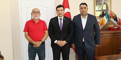 MHP Meclis Üyesi Aslan, Keban Kaymakamı Atalık'ı makamında ziyaret etti